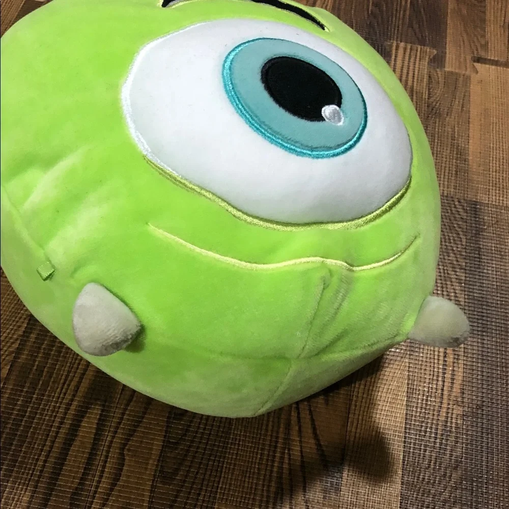 Disney Mike Wazowski Plush Pillow in Lime Green with Teal Eye.